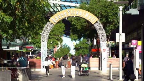 Static-shot-capturing-landmark-Queen-street-mall-archway-sign-with-large-crowds-of-people,-students,-tourists-and-workers-walking-and-strolling-at-the-outdoor-pedestrian-shopping-mall-at-Brisbane-city