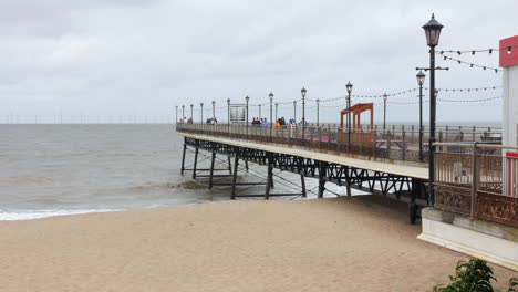Pier-on-the-coast-in-the-holiday-town-of-Skegness-on-the-beach-promenade-in-summer