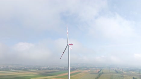 Wind-Turbine-In-The-Weinviertel-Region-On-A-Foggy-Day-In-Austria---aerial-drone-shot