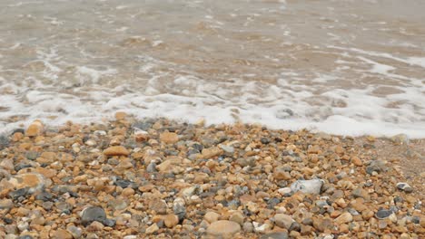 Close-up-of-British-pebble-beach-in-Seaford-coast