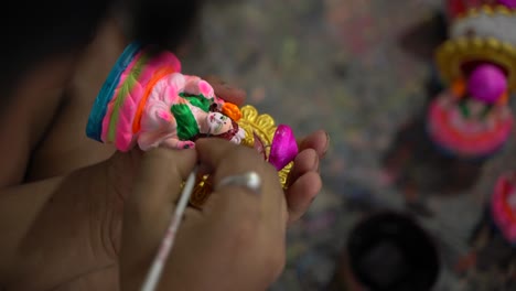 A-potter-is-making-and-painting-an-idol-of-a-Hindu-god