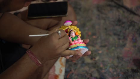 A-potter-is-making-and-painting-an-idol-of-a-Hindu-god