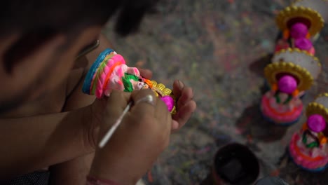 A-potter-is-making-and-painting-an-idol-of-a-Hindu-god