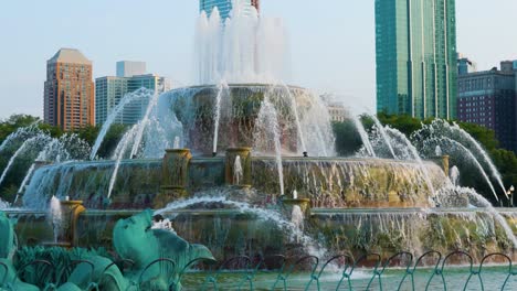 Chicago-IL-USA-June-27th-2023:-tourist-are-enjoying-a-nice-summer-evening-at-Buckingham-fountain-in-Chicago-at-sunset
