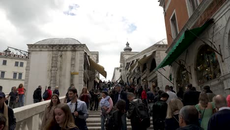 Busy-Scene-With-Tourists-At-Bottom-Of-Rialto-Bridge-In-Venice