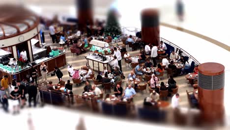 Cinematic-shot-of-People-enjoying-Food-court-in-Dubai-Mall,-UAE,-United-Arab-Emirates,-Selective-Focus-and-rock-focus-of-crowd-of-people-in-food-court
