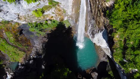 Breathtaking-Aerial-Shot-of-Berglistüber-Waterfall-in-Switzerland