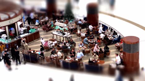 Selective-Focus-and-rock-focus-of-People-enjoying-Food-court-in-Dubai-Mall,-UAE,-United-Arab-Emirates,-Cinematic-shot-of-crowd-of-people-in-food-court