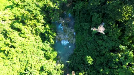 Aerial-drone-shot-of-holiday-tourist-attraction-Evergreen-Cascades-Waterfall-stream-water-tropical-rainforest-travel-tourism-in-Port-Vila-Efate-Vanuatu-Pacific-Islands-4K