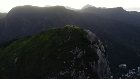 Drone-shot-around-the-Don-Irmaos-mountain,-sunny-evening-in-Rio-de-Janeiro,-Brazil