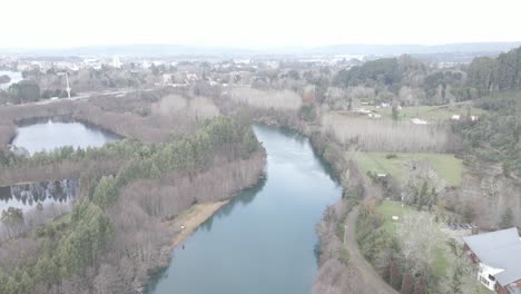 Aerial-shot-Calle-Calle-River-in-Valdivia,-Chile