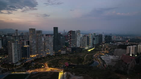 Aerial-view-toward-luxury-apartments-at-the-La-Mexicana-Park,-dusk-in-Santa-Fe,-Mexico