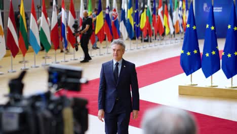 Prime-Minister-of-Slovenia-Robert-Golob-arriving-at-the-European-Council-summit-in-Brussels,-Belgium---Slow-motion