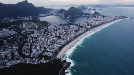 Aerial-view-toward-the-Ipanema-beach,-gloomy-evening-in-Rio-de-Janeiro,-Brazil