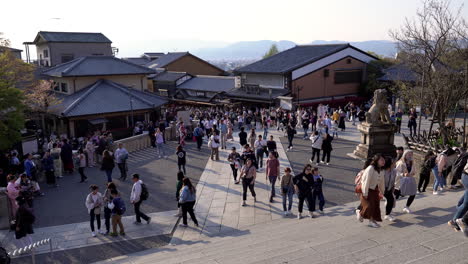 KYOTO,-JAPAN---April-3,-2023:-Tourist-walking-on-stairs-at-Kiyomizu-dera-temple