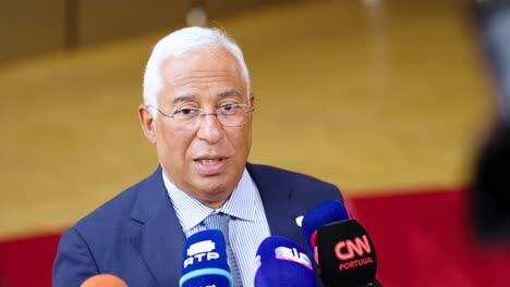 Prime-Minister-of-Portugal-António-Costa-giving-an-interview-during-the-European-Council-summit-in-Brussels,-Belgium---Close-shot