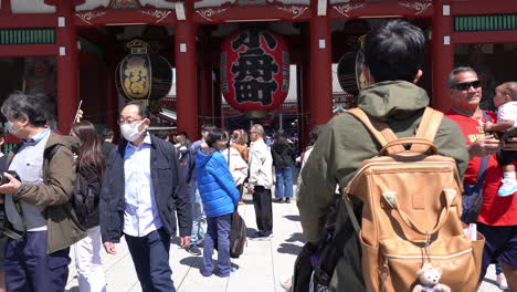 TOKYO,-JAPAN---APRIL-9,-2023:-People-walking-in-Senso-ji-temple-in-Asakusa