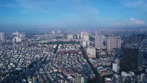 Fly-in-drone-shot-over-district-four-residential-area-in-Ho-Chi-Minh-City-Vietnam-early-on-a-sunny-morning