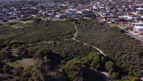 Aerial-Orbit-View-Of-Nature-Reserve-Surrounded-By-Houses-Near-Quinns-Rocks,-Mindarie-Beaches-Perth