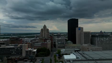 Montreal-Downtown-Aerial-flyover-cloudy-dark-surrounding-old-town-sky-overlooking-International-business-district-overlooking-the-main-convention-center-and-headed-to-Notre-Dame-YUL2-3