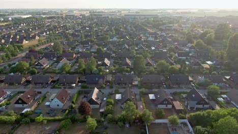 Quiet-residential-area-from-above-during-sunset-with-hazy-sky