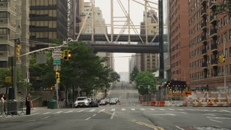 People-And-Traffic-On-Street-On-NYC's-Upper-East-Side