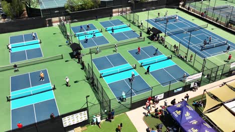 Rising-aerial-of-National-Pickleball-tournament-in-Valencia,-CA-on-sunny-day
