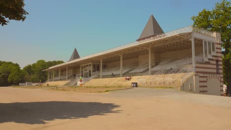 Pan-shot-of-the-historic-grandstand-of-the-Boitsfort-racecourse-in-Brussels,-Belgium