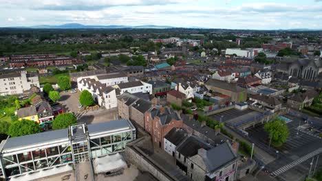 Backward-drone-over-Limerick-city-and-King-John's-Castle-on-clear-day