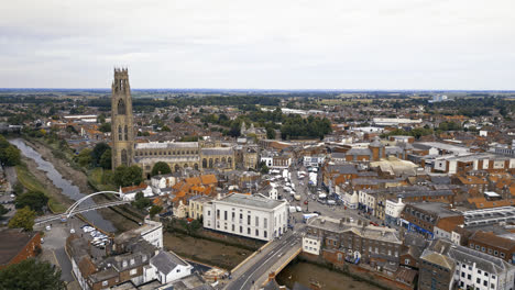scenic-beauty-of-Boston,-Lincolnshire,-in-mesmerizing-aerial-drone-footage:-Port,-ships,-Saint-Botolph-Church-,-Saint-Botolph's-Bridge