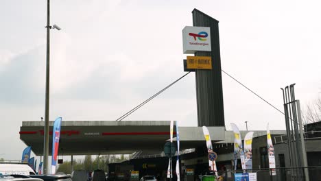 View-of-Total-Energies-Belgian-fuel-station-along-the-highway---Waarloos,-Belgium