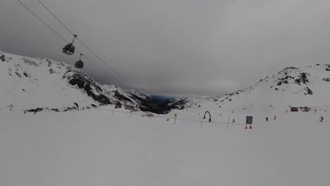 Skier-under-lift---POV-Group-Snowboarding-Down-Ski-Slope-in-6K-|-Insta360