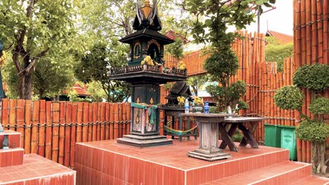 Thai-Spirit-House-with-Buddhist-Statues-at-the-Secret-Garden-on-the-Island-of-Koh-Samui,-Thailand