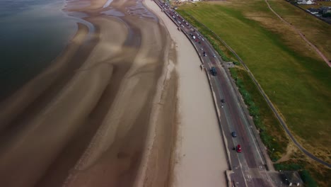 The-beach-and-beyond-at-Ayr-on-the-South-West-Coast-of-Scotland,-aerial