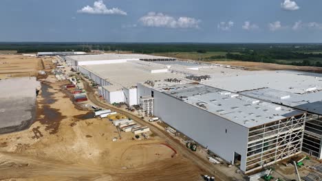 4K-Aerial-reveal-of-BlueOval-City-construction-in-Stanton,-TN