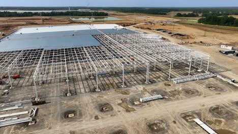 Aerial-orbit-of-steel-structure-at-BlueOval-City-in-Stanton,-TN