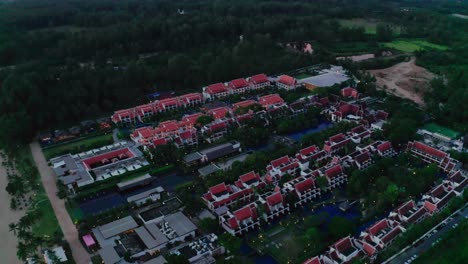 Stunning-Night-Aerial-View-of-the-Luxury-Hotels-with-Swimming-Pools-Next-to-Marriott-Khao-Lak-Resort-and-Spa,-Phuket,-Thailand