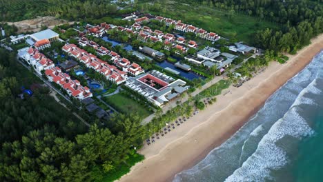 Luxury-hotel-on-the-beach,-aerial-view-of-an-expensive-luxury-hotel-of-Marriott-Khao-Lak-Resort-and-Spa-in-Phuket,-aerial-view