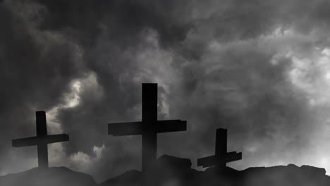 three-silhouetted-crosses-on-rock-mound-with-thunderstorm-background
