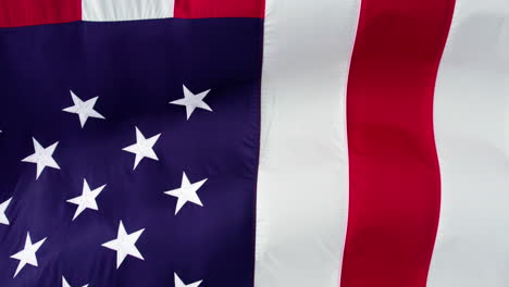 Downward-aerial-view-over-the-waving-American-flag