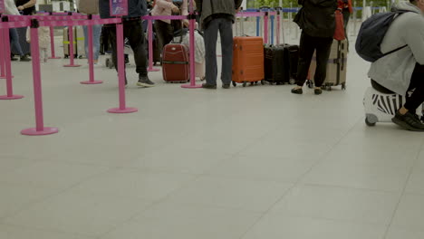 Passengers-queue-up-for-check-in-at-the-airport