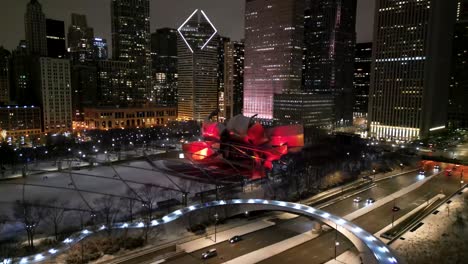Chicago-IL-USA,-Aerial-View-of-Night-Traffic,-Millennium-Park-and-Skyscrapers-in-Lights,-Drone-Shot