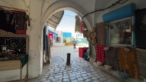 Traditional-shops-of-Houmt-El-Souk-bazaar-in-Djerba,-Tunisia