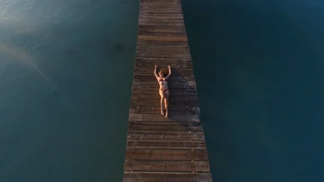 woman-lying-on-the-jetty