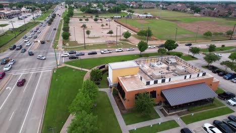 Aerial-footage-of-Buffalo-Wild-Wings-in-Flower-Mound-Texas-located-at-3780-Justin-Rd,-Highland-Village,-TX-75077