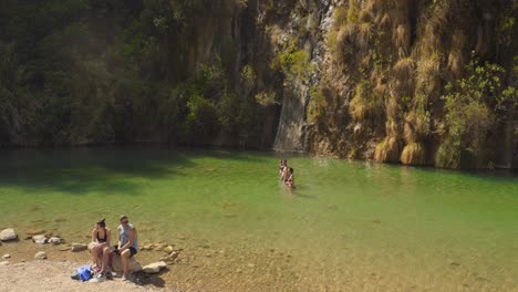 People-Enjoying-Summer-At-Natural-Spring-Water-Pool-In-Fuente-de-los-Baños,-Montanejos,-Spain