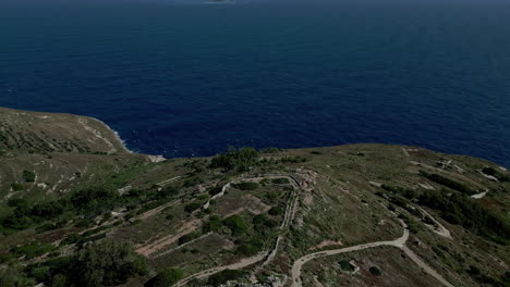 Aerial-shot-above-Dingli-Cliff-towards-the-sea