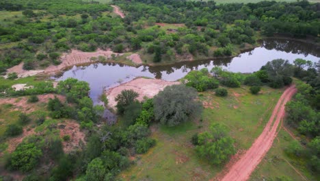 Aerial-footage-of-a-pond-on-a-ranch-in-Texas