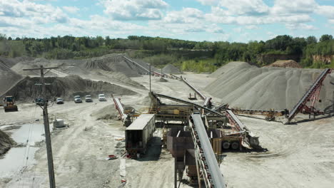 Daylight-Aerial-Wide-Shot-of-Limestone-Quarry-with-Active-Conveyor-Systems