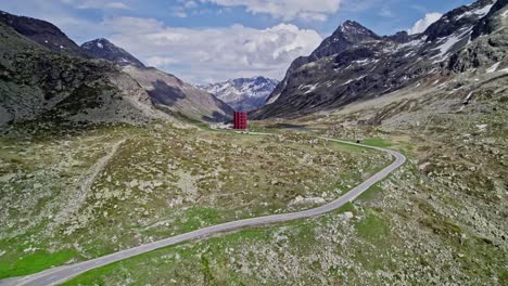 Aerial-Flying-Over-Julier-Pass-Towards-Origens-Juliertheatre-Beside-Lake-Lej-da-Güglia-With-Majestic-Valley-Views-In-The-Background